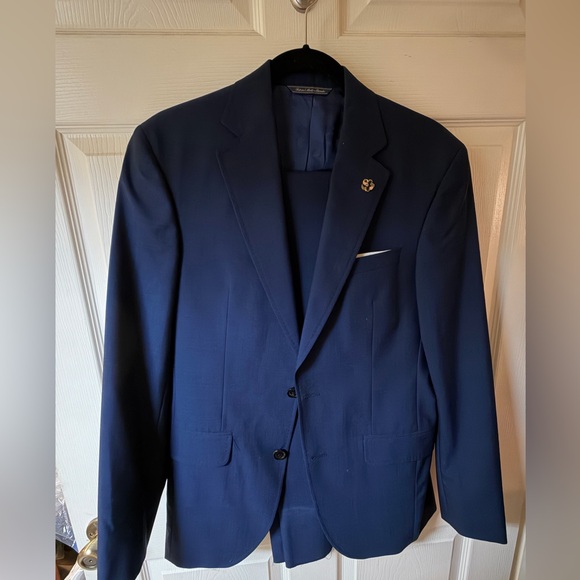 Ted Baker men’s navy wool suit trim fit retails for $800
